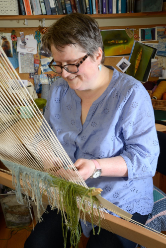Katie Russell at the loom - photo Euan Henderson